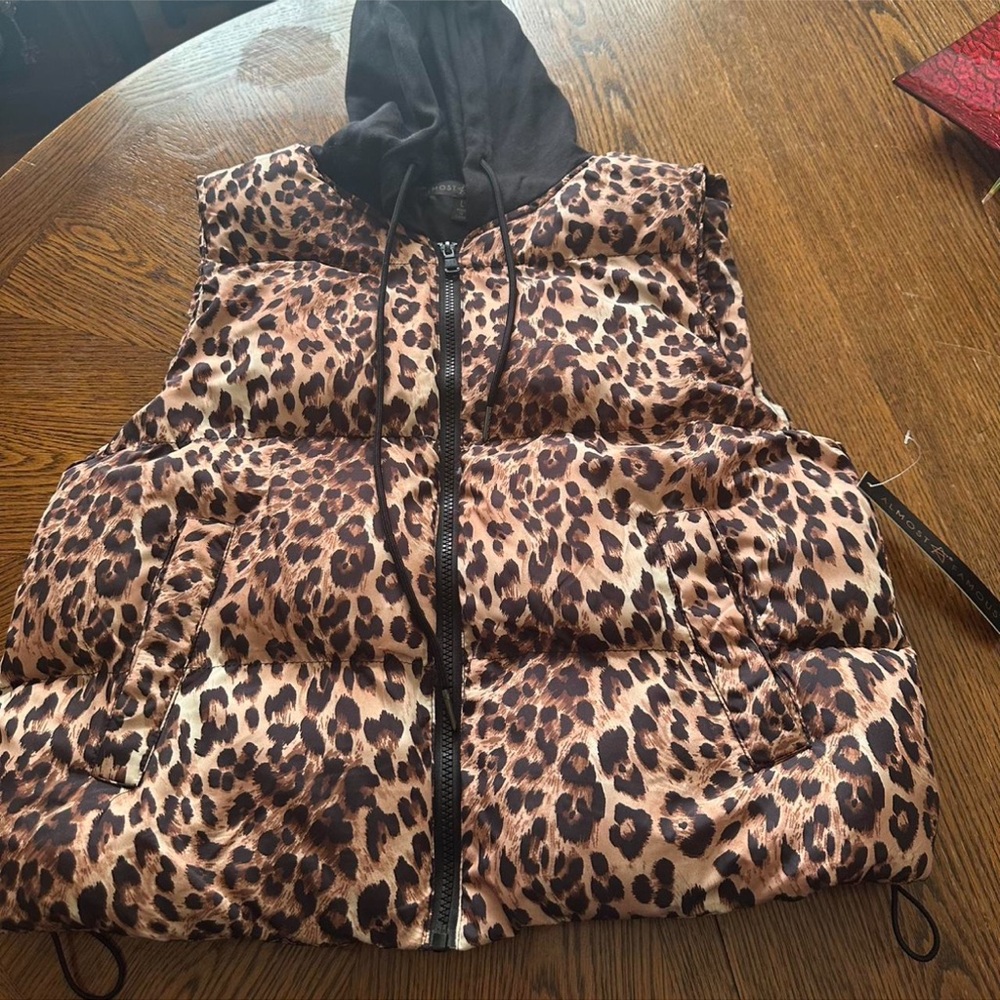 Almost Famous Leopard Print Vest with Black Hood
Size large juniors